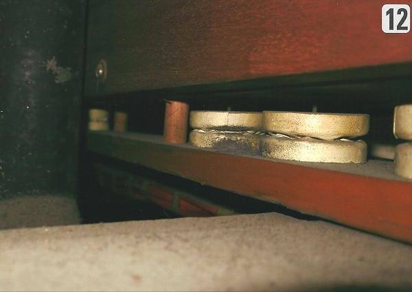 Leaky 2″ leather motors on pedal soundboard.